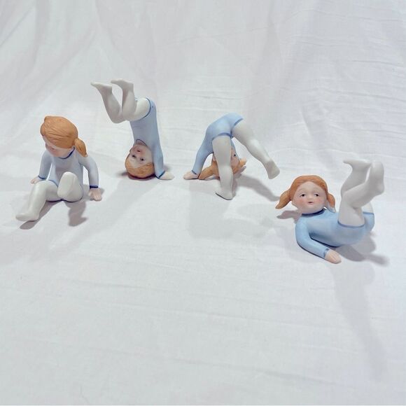 Ron Gordon Little somersaulting girl in blue leotard porcelain gymnast statues - Picture 1 of 13
